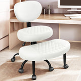 White adjustable office chair with quilted seat and backrest on a wheeled base in a home office