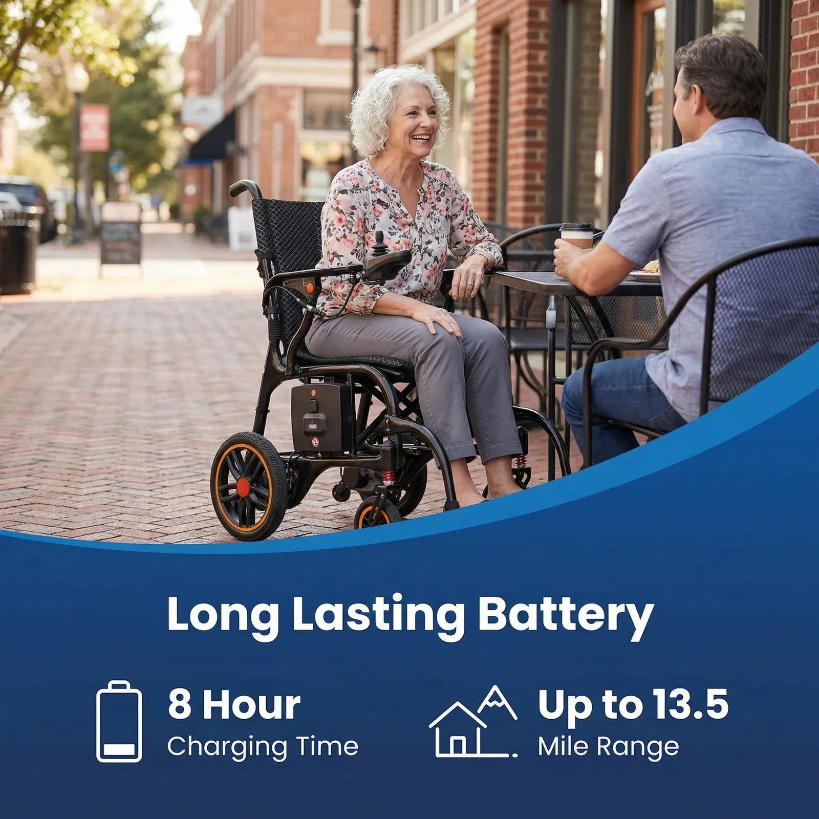 Woman in a wheelchair sitting at an outdoor cafe with a man, with text about battery life and range.